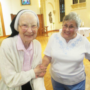 Sister Emerentia Wiesner, left, and Sister Karla Kaelin are joyful in the chapel.