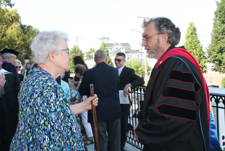 Sister Michele Morek, a former professor at Brescia, talks with former Brescia president Father Larry Hostetter after the ceremony. Sister Michele Morek, a former professor at Brescia, talks with former Brescia president Father Larry Hostetter after the ceremony.