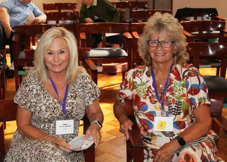 1975 classmates Lisa Calhoun Mulligan, left, and Mary-Anne Cossey Powers are all smiles before Mass. They and their classmates were celebrating 50 years since they graduated from the Academy. 1975 classmates Lisa Calhoun Mulligan, left, and Mary-Anne Cossey Powers are all smiles before Mass. They and their classmates were celebrating 50 years since they graduated from the Academy.