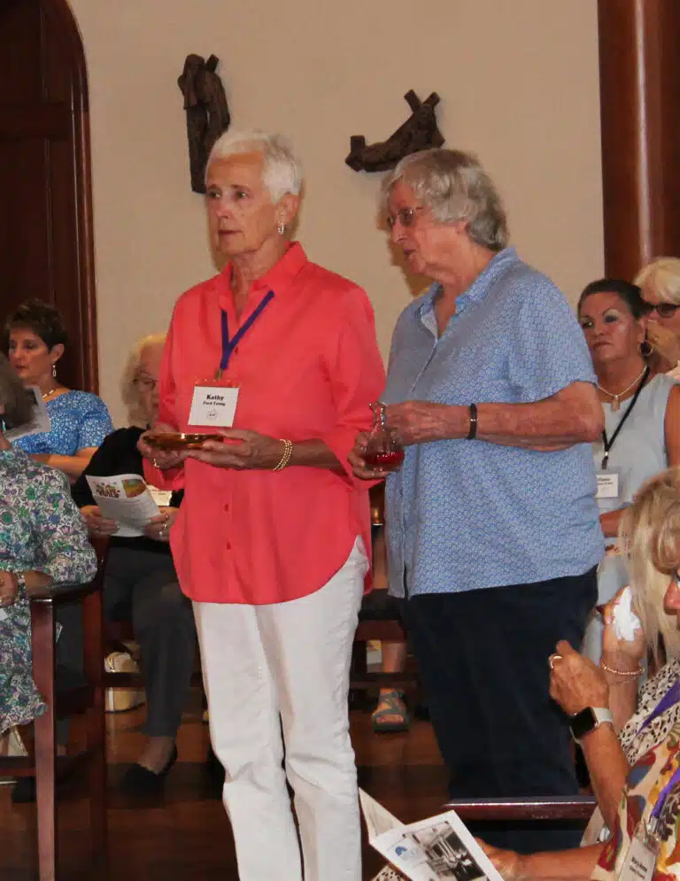 Kathy Ford Young, left, and Loretta White Hamby prepare to bring up the gifts. They are both 1970 graduates, who were celebrating their 55th reunion. Kathy Ford Young, left, and Loretta White Hamby prepare to bring up the gifts. They are both 1970 graduates, who were celebrating their 55th reunion.