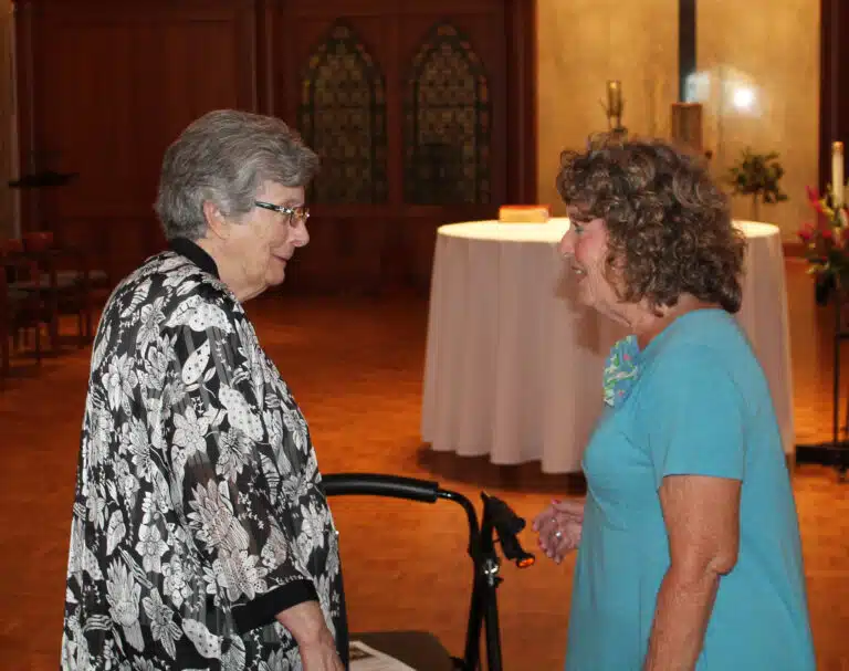 Sister Margaret Ann Aull talks with Mary Margaret Drury A’66. Sister Margaret Ann Aull talks with Mary Margaret Drury A’66.