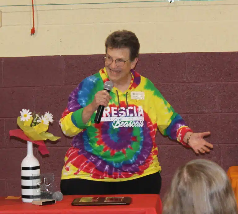 Sister Sharon Sullivan, congregational leader of the Ursuline Sisters, “got the memo” about the Woodstock theme for Alumnae Weekend, and wore her tie-dye to welcome the guests. Sister Sharon Sullivan, congregational leader of the Ursuline Sisters, “got the memo” about the Woodstock theme for Alumnae Weekend, and wore her tie-dye to welcome the guests.