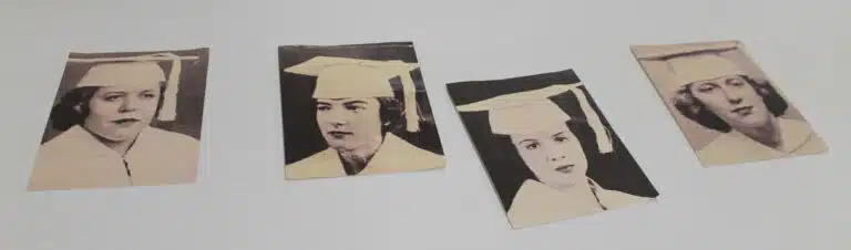Graduation pictures of each of the alums living at the Carmel Home were spread out on a table. Graduation pictures of each of the alums living at the Carmel Home were spread out on a table.