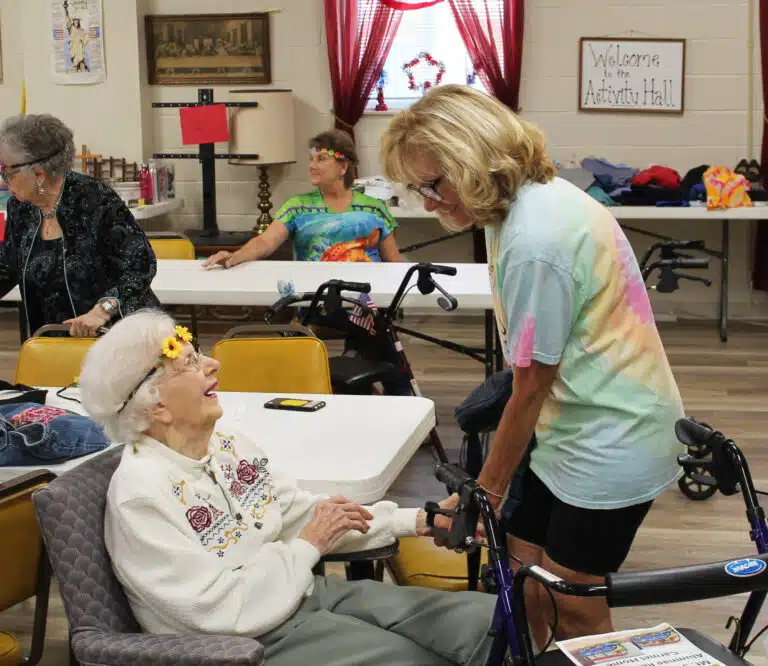 Mary Ruth Warren A’44, laughs as she talks with one of her nieces, Imelda Warren Cecil A’71. Mary Ruth will turn 100 years old in January. Mary Ruth Warren A’44, laughs as she talks with one of her nieces, Imelda Warren Cecil A’71. Mary Ruth will turn 100 years old in January.