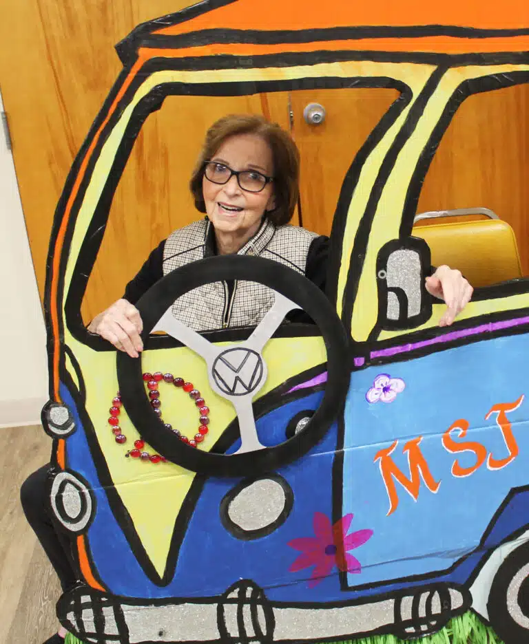 Doris Mills Beavin A’54 is taking her bus driving seriously. Doris Mills Beavin A’54 is taking her bus driving seriously.