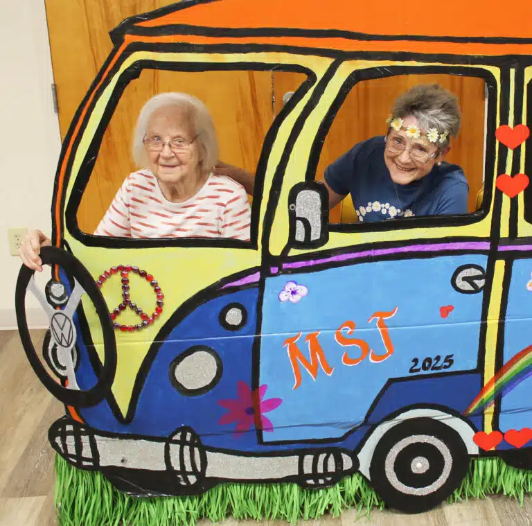 Stephanie Warren A’73 takes a ride on the bus with her mother, Rose Warren. Rose attended St. Frances Academy in Owensboro, because at the time there was no bus to take her to Mount Saint Joseph Academy. Stephanie Warren A’73 takes a ride on the bus with her mother, Rose Warren. Rose attended St. Frances Academy in Owensboro, because at the time there was no bus to take her to Mount Saint Joseph Academy.