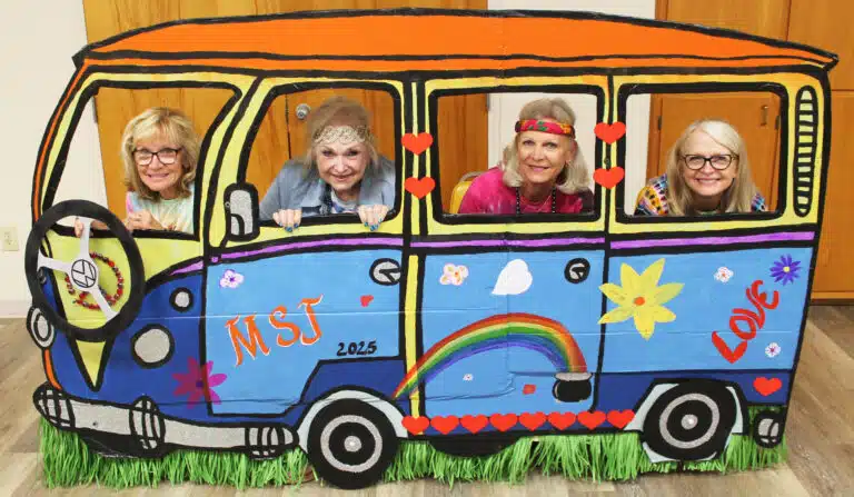 The Warren sisters take a ride on the bus together. From left are Imelda Cecil A’71, Georgia Bottles A’68, Karen Gilbert A’76, and Rhonda Mischel A’73. The Warren sisters take a ride on the bus together. From left are Imelda Cecil A’71, Georgia Bottles A’68, Karen Gilbert A’76, and Rhonda Mischel A’73.