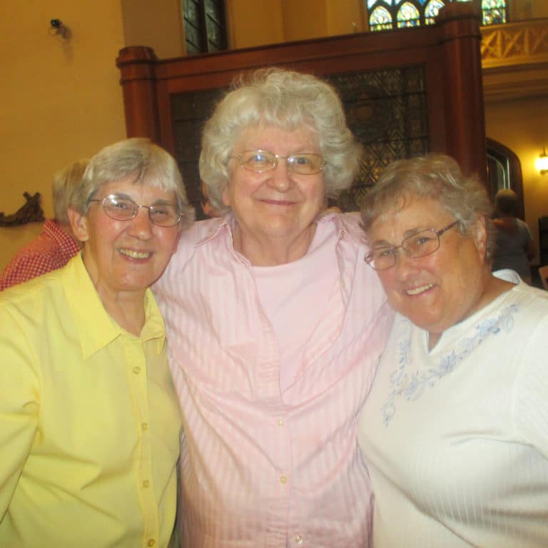 Sister Julia Head, left, Sister Francis Louise Johnson, center, and Sister Karla Kaelin enjoy some camaraderie in the chapel.