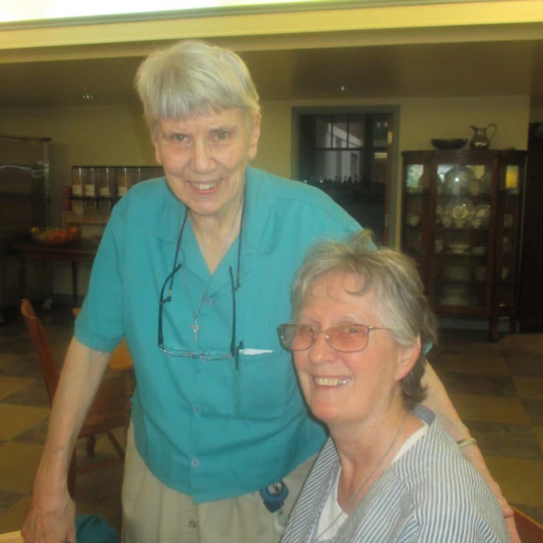 Sister Sheila Anne Smith, left, visits with Sister Mary Ellen Backes, who serves in Springfield, Ill.