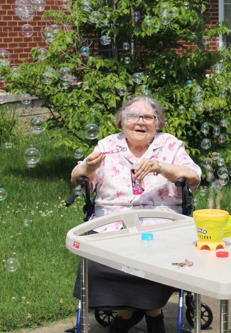 Sister Lois Lindle celebrated her birthday among the bubbles, especially those from a bubble-making machine.
