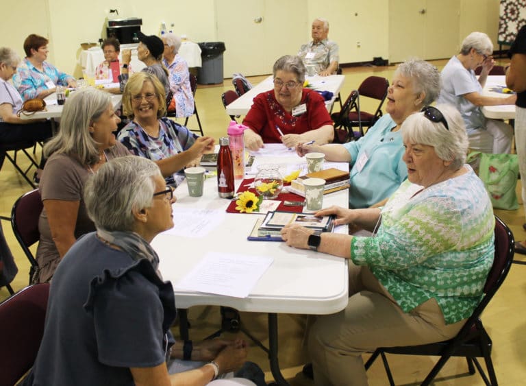 This group of Owensboro Associates and Sister Rose Jean Powers find something to laugh about prior to the morning session beginning. From left are Carolyn McCarty, Debbie Lanham, Susie Westerfield, Sister Rose Jean, Karen Wells and Donna Favors.