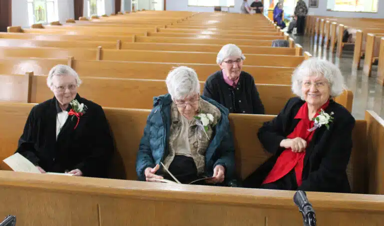 In the front row from left are jubilarian Ursuline Sisters Marie Joseph Coomes (60 years), Jane Falke (70 years), and Francis Louise Johnson (70 years), with Sister Julia Head joining in the second row. In the front row from left are jubilarian Ursuline Sisters Marie Joseph Coomes (60 years), Jane Falke (70 years), and Francis Louise Johnson (70 years), with Sister Julia Head joining in the second row.