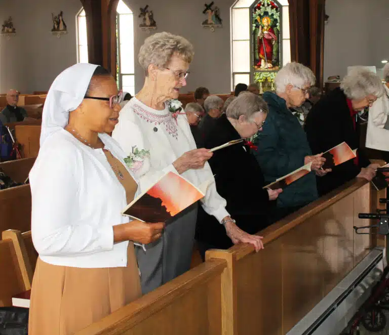 The jubilarian sisters renew their vows in response to questions from Bishop Medley. From left are Franciscan Sister Consolata Ojemeh (25 years), School Sister of Notre Dame Janette Fennewald (60 years), Ursuline Sister Marie Joseph Coomes (60 years), Ursuline Sister Jane Falke (70 years), and Ursuline Sister Francis Louise Johnson (70 years). The jubilarian sisters renew their vows in response to questions from Bishop Medley. From left are Franciscan Sister Consolata Ojemeh (25 years), School Sister of Notre Dame Janette Fennewald (60 years), Ursuline Sister Marie Joseph Coomes (60 years), Ursuline Sister Jane Falke (70 years), and Ursuline Sister Francis Louise Johnson (70 years).