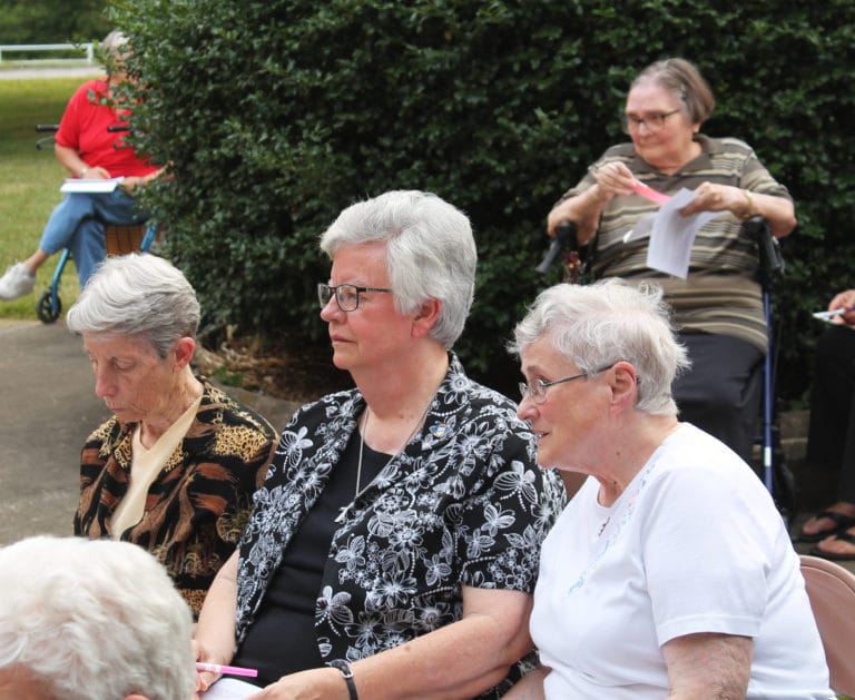 Sister Karla Kaelin, right, Sister Mary Timothy Bland, center, and Sister Maureen O’Neill discuss their thoughts on the building. Sister Karla is a 1963 Academy graduate, and Sister Maureen graduated in 1966.