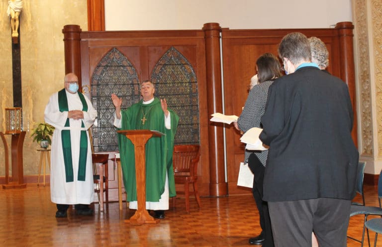 Bishop William Medley, second from left, is joined by Father Ray Goetz, chaplain at Maple Mount, in offering his blessing to the new Council. He asked God to give the new Council “hearts full of compassion for the Sisters entrusted to their care. By word and example may they encourage their Sisters to grow in love of you and their neighbor. Together with their Sisters, may they live the life of the Gospel and enter with them into the unending joy of heaven.”