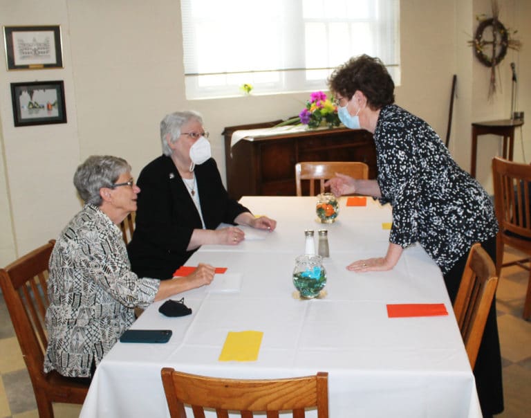 All in attendance were invited to the dining room for lunch. Sister Laurita Spalding, right, chats with Sister Judith Nell Riney, left, and Sister Pat Lynch.