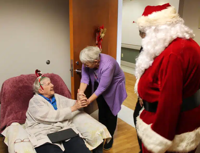 Sister Grace Simpson enjoyed her visit from Santa, and from her prayer companion, Sister Mary Celine Weidenbenner. Sister Grace Simpson enjoyed her visit from Santa, and from her prayer companion, Sister Mary Celine Weidenbenner.