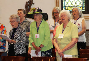 Singing the entrance hymn “Come Holy Ghost” are, from left, Sister Ann Patrice Cecil, A57; Sister Melissa Tipmore, A63; Ginger Ford Green, A57; Rhonda Warren Mischel, A73; Sister Vivian Bowles, A57, and Rose Turnquist Mann, A73.