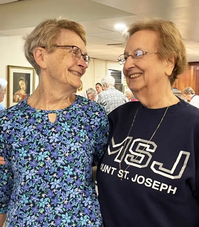 School Sister of Notre Dame Jeannette Fennewald, left, is happy to see Ursuline Sister Susan Mary Mudd. School Sister of Notre Dame Jeannette Fennewald, left, is happy to see Ursuline Sister Susan Mary Mudd.