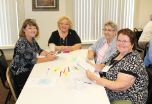 Three Kansas associates join Associate Jean Simpson of Central City, Ky., second from left. At left is Carol O’Keefe, then Mary Ann Stewart and Marilyn Katzer.
