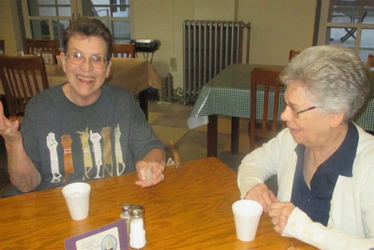 Sister Sharon Sullivan, left, draws a laugh from Sister Nancy Murphy. The two served in leadership together from 2010-16.