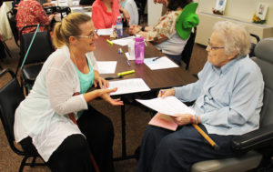 Sharon Higdon, left, of Elizabethtown, Ky., talks with Sister Mary Angela Matthews during the one-on-one. Higdon is considering becoming an associate.