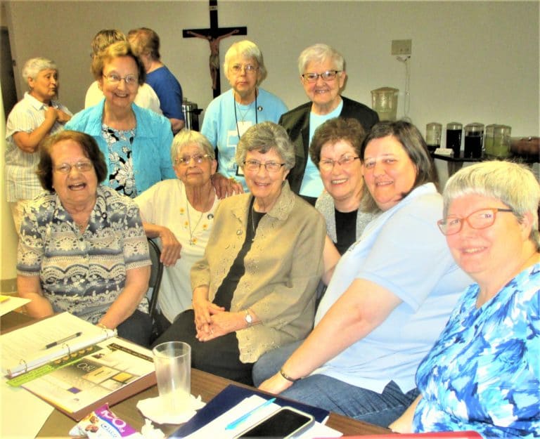 This group is having way too much fun! Standing from left are Sister Susan Mary Mudd, Sister Angela Fitzpatrick and Sister George Mary Hagan; seated from left are Sisters Rosanne Spalding, Mary Celine Weidenbenner, Margaret Ann Aull, Laurita Spalding, Monica Seaton and Mary McDermott.