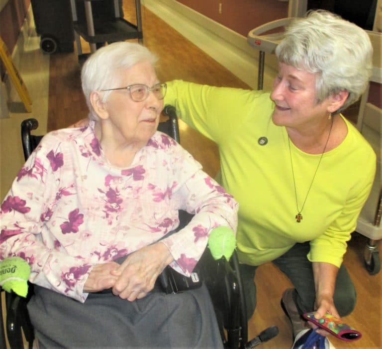 Sister Marie Julie Fecher, left, imparts some wisdom to Sister Pam Mueller. Sister Marie Julie will celebrate 80 years as a Sister in 2022.