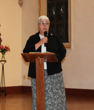 Following the Gospel reading, Sister Ann McGrew, director of novices, calls Sister Stephany forth to make her religious profession.