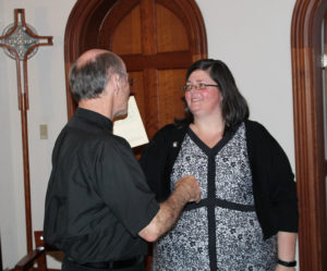 Sister Stephany receives congratulations from Father Jerry Riney following Mass. Father Riney was the pastor at Holy Spirit Church in Bowling Green, Ky.., in 2005 when Sister Stephany converted to Catholicism.