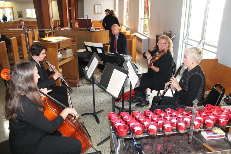 Mike Bogdan, center, director of the Office of Music for the Diocese of Owensboro, arranged the music for the ceremony, utilizing this quartet and two cantors.