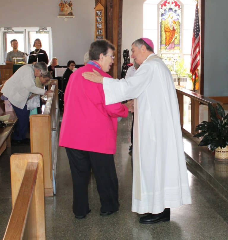Bishop Medley congratulates Sister Sharon Sullivan, who is celebrating 40 years as an Ursuline.