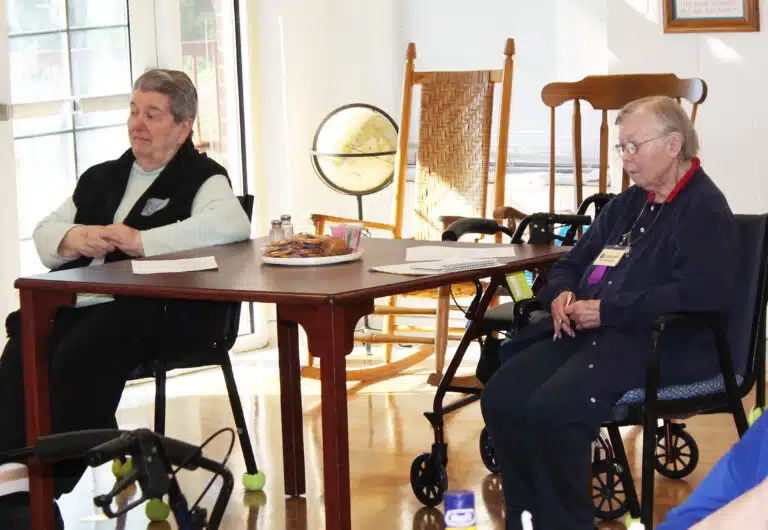 Sister Rose Jean Powers, left, and Sister Marie Joseph Coomes listen to Brother Zachary. The retreat is weaving together reflections on hope and how prayer with scripture can focus and promote the virtue of hope in our lives. Sister Rose Jean Powers, left, and Sister Marie Joseph Coomes listen to Brother Zachary. The retreat is weaving together reflections on hope and how prayer with scripture can focus and promote the virtue of hope in our lives.