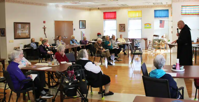 Brother Zachary addresses 28 Ursuline Sisters who are gathered in the Rainbow Room of Saint Joseph Villa. Brother Zachary addresses 28 Ursuline Sisters who are gathered in the Rainbow Room of Saint Joseph Villa.