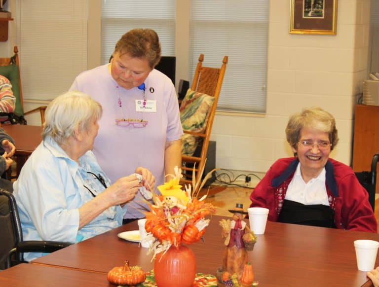 Sister Alicia visits with Sister Sheila Anne Smith, left, and Sister Rose Karen Johnson.