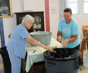 Ursuline Associate Tina Wolken, right, volunteered for the “second shift” with Ursuline Sister Angela Fitzpatrick.