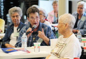 Sister Sharon Sullivan, center, says when she was in college, there was a coffee shop called “The Listening Eye.” It was a good reminder that we hear in different ways. Sister Nancy Murphy, left, and Sister Marcella Schrant listen to Sister Sharon.