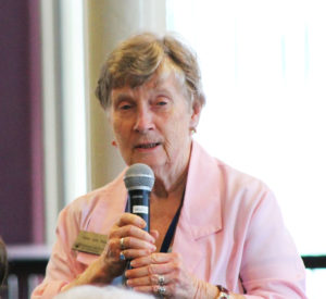 Sister Julia Davis, an Ursuline Sister of Louisville, tells the sisters about the death of a priest they may have known in the Archdiocese of Louisville.