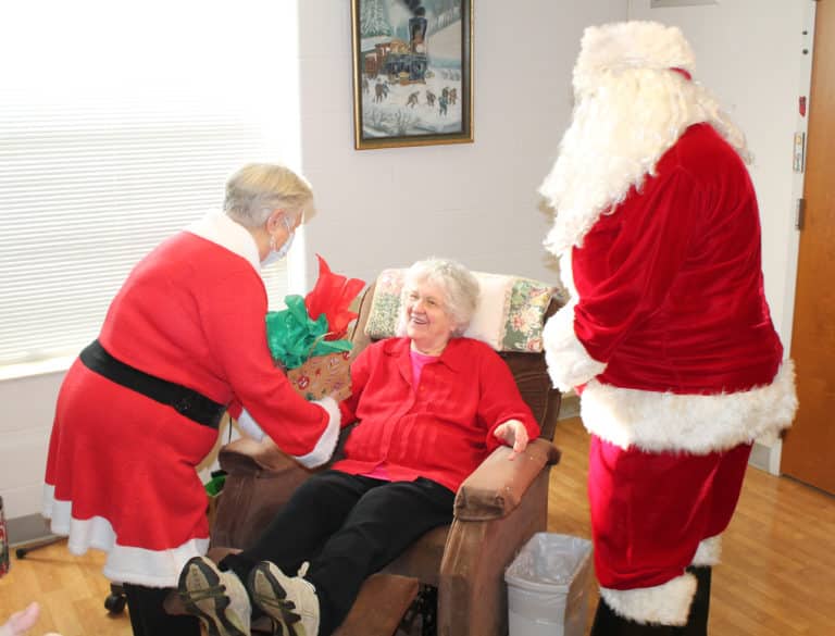 Sister Francis Louise Johnson was happy to welcome Santa and Mrs. Claus. She was raised in the western Kentucky city of Mayfield.