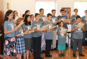 Members of the choir sing a “Sanctus” for the Ursuline Sisters. Youths from 9-18 can participate in the camp to learn church music, and members come from all over the country.