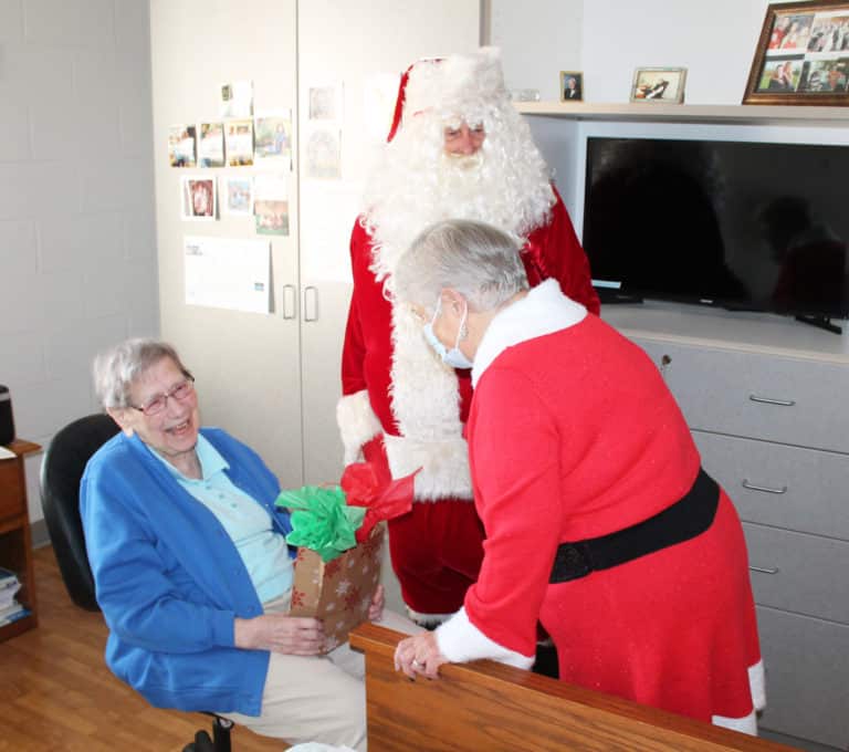 Sister Susanne Bauer was giddy with joy at her visit from Santa.