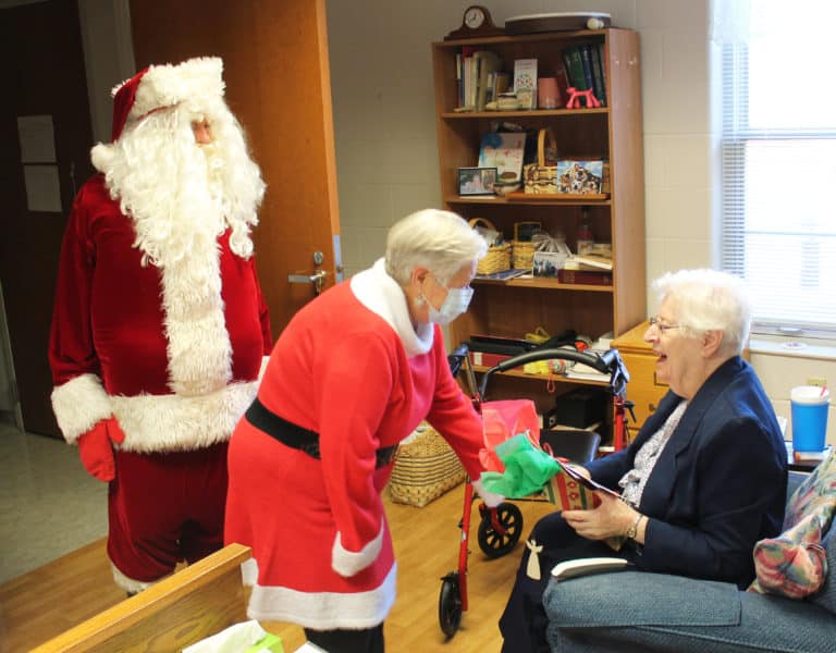 Sister Eva Boone was all smiles during her visit with Santa. Sister Eva is celebrating 70 years as a Sister this year.