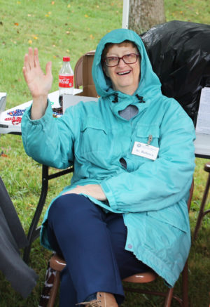 The rain and cooler temperatures didn’t dampen the spirits of Sister Rebecca White, who greeted visitors to Eastbridge with a big smile.