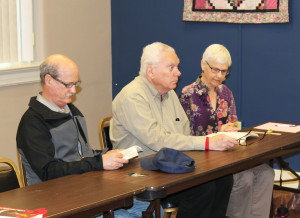 Mike Freels, left, attended his first book study, along with Chris and Joyce Kormelink.