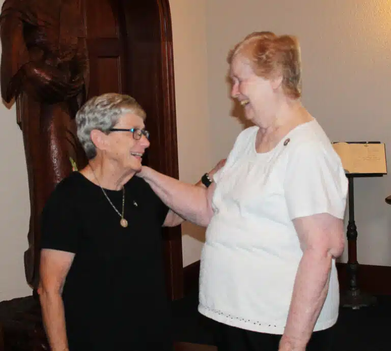 Sister Judith Nell Riney, left, smiles with Sister Helena Fischer. The two served together at Brescia University for 35 years. Sister Judith Nell Riney, left, smiles with Sister Helena Fischer. The two served together at Brescia University for 35 years.