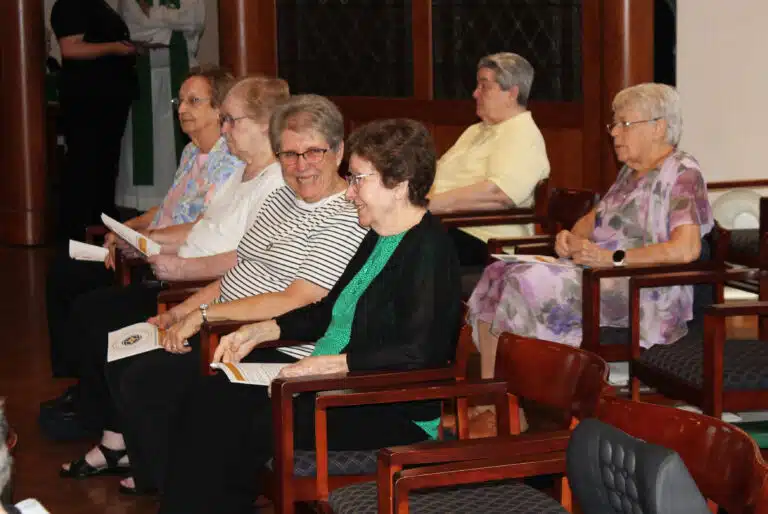 As many of the Ursuline Sisters as possible attended the installation. Before Mass, Sister Betsy Moyer, center, and Sister Mary Henning share a laugh. At the end of the row are Sisters Susan Mary Mudd and Helena Fischer. In the back are Sister Rose Jean Powers, left, and Sister Angela Fitzpatrick. As many of the Ursuline Sisters as possible attended the installation. Before Mass, Sister Betsy Moyer, center, and Sister Mary Henning share a laugh. At the end of the row are Sisters Susan Mary Mudd and Helena Fischer. In the back are Sister Rose Jean Powers, left, and Sister Angela Fitzpatrick.