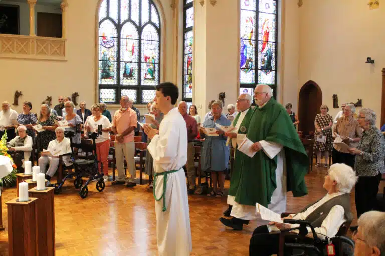 Three Ursuline Associates played a role in the Mass. Seminarian Wes Wheatley, in white, served at Mass, while Father Ray Goetz, right, and Father John Vaughan concelebrated. Three Ursuline Associates played a role in the Mass. Seminarian Wes Wheatley, in white, served at Mass, while Father Ray Goetz, right, and Father John Vaughan concelebrated.