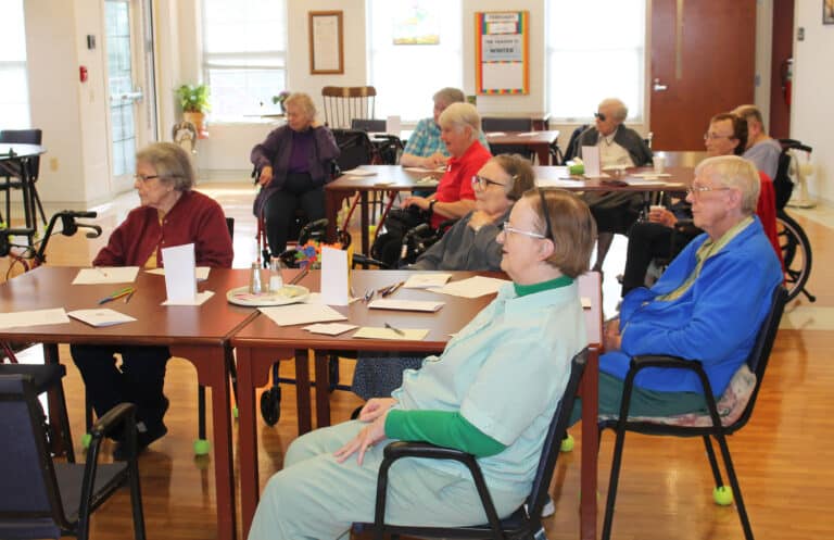 Sisters gathered in the Rainbow Room to listen to Sister Pat’s talk each day. On Feb. 28, the Sisters in the foreground are, from left, Sister Catherine Barber, Sister Lois Lindle, Sister Rebecca White and Sister Grace Simpson, who was visiting for two weeks.