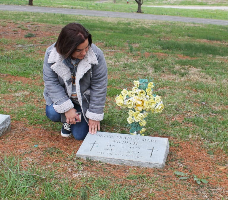 Fanny Gonzalez visits the grave of Sister Fran Wilhelm on March 14, 2023. “I know my mom and Sister Fran are together and having a good time,” Fanny said.