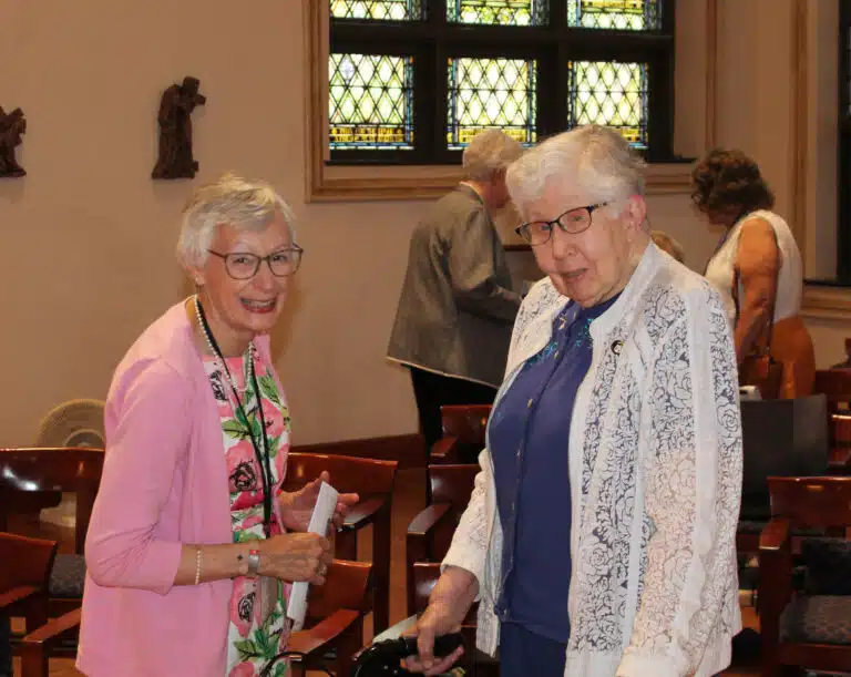 Carolyn Drury McCarty A’71, visits with Sister Ruth Gehres A’51, after Mass. Carolyn Drury McCarty A’71, visits with Sister Ruth Gehres A’51, after Mass.